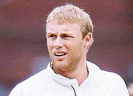 Englands captain Andrew Flintoff in a despondent mood during the fifth day of  first Test  against Sri Lanka at Lords in London on Monday.
